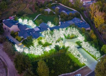 Tis the season: Kim Kardashian went all out with Christmas lights on her $60million Hidden Hills estate nestled in the west end of the San Fernando Valley