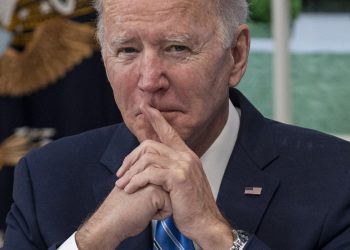 U.S. President Joe Biden listens while joining the White House Covid19 Response Team's call with the National Governors...