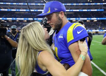 Los Angeles Rams' Matthew Stafford celebrates with Kelly after the NFC Championship NFL football game against the San Francisco 49ers on Sunday, Jan. 30, 2022.