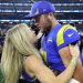 Los Angeles Rams' Matthew Stafford celebrates with Kelly after the NFC Championship NFL football game against the San Francisco 49ers on Sunday, Jan. 30, 2022.