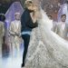 MARRY ME, center, from left: Owen Wilson, Jennifer Lopez, 2022. ph: Barry Wetcher / Universal Pictures / Courtesy Everett Collection