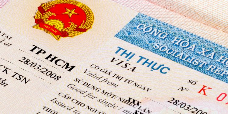 A Vietnam tourist visa in a passport