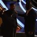 Denzel Washington, left, Will Smith, center,  and Tyler Perry, console an emotionally unstable Will Smith during the Oscars