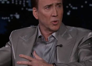 Image may contain Nicolas Cage Human Person Crowd Clothing and Apparel