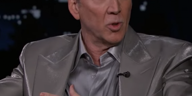 Image may contain Nicolas Cage Human Person Crowd Clothing and Apparel