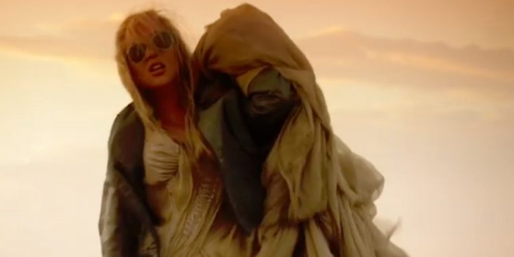 Lady Gaga Wore Tom Cruise’s Original Top Gun Jacket In The ‘Hold My Hand’ Music Video