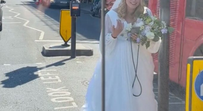 Anastasia Medvedskaya walks to Marksteen Adamson's car after she flagged him down and ask for a ride to the church.