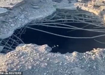 Heavy damage is seen to Antonovsky Bridge, in Kherson, after Ukraine used HIMARS missiles to strike it - making it impassable